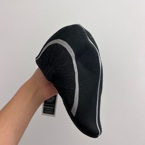 black cap with gray stripe